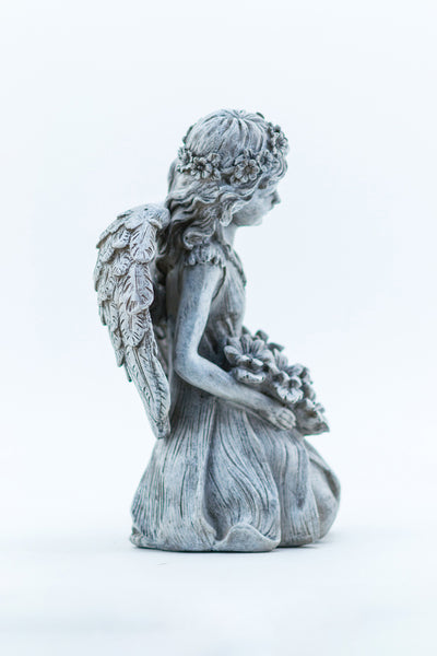 Angel Kneeling Holding Flowers HI-LINE GIFT LTD.