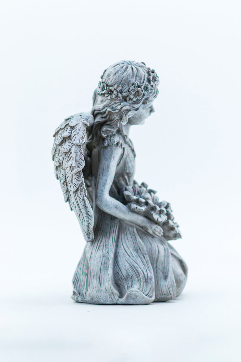 Angel Kneeling Holding Flowers HI-LINE GIFT LTD.