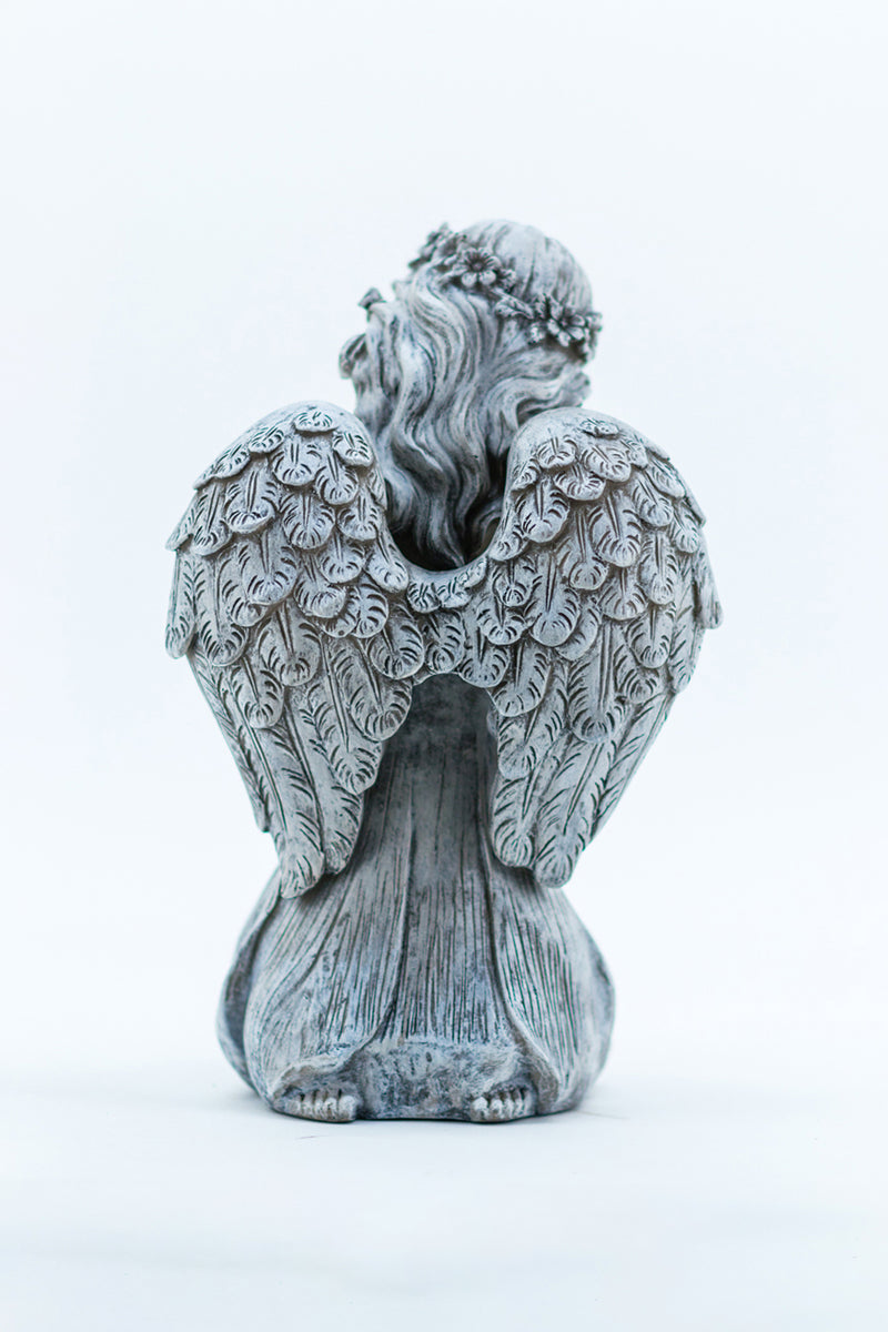 Angel Kneeling Holding Flowers HI-LINE GIFT LTD.