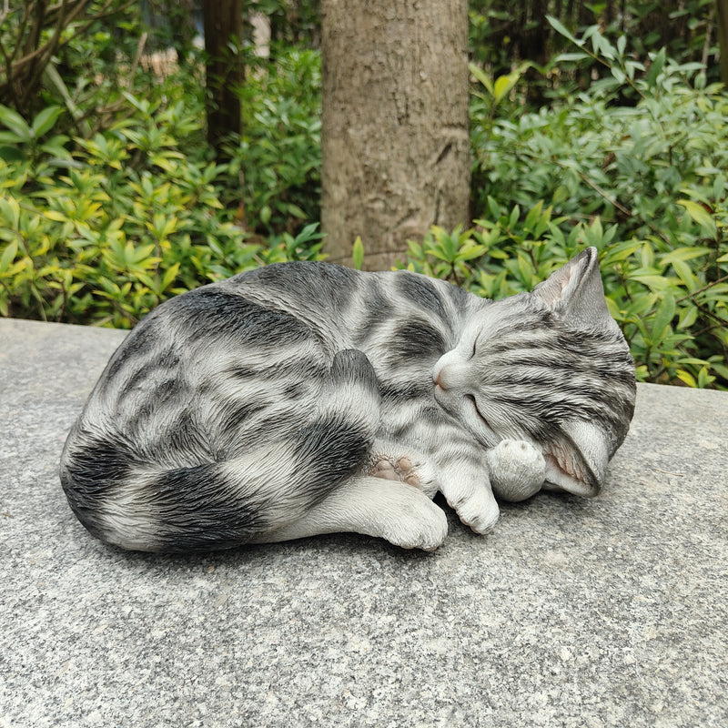 87728-D - Tabby Dreams: Enchanting Black Polyresin Sleeping Cat Figurine Hi-Line Gift Ltd.