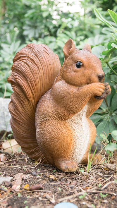 Brown Squirrel Eating Statue HI-LINE GIFT LTD.