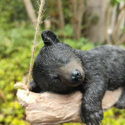 87957-O - Suspended Cub Serenity: Striking Black Hanging Bear Polyresin Figurine Hi-Line Gift Ltd.