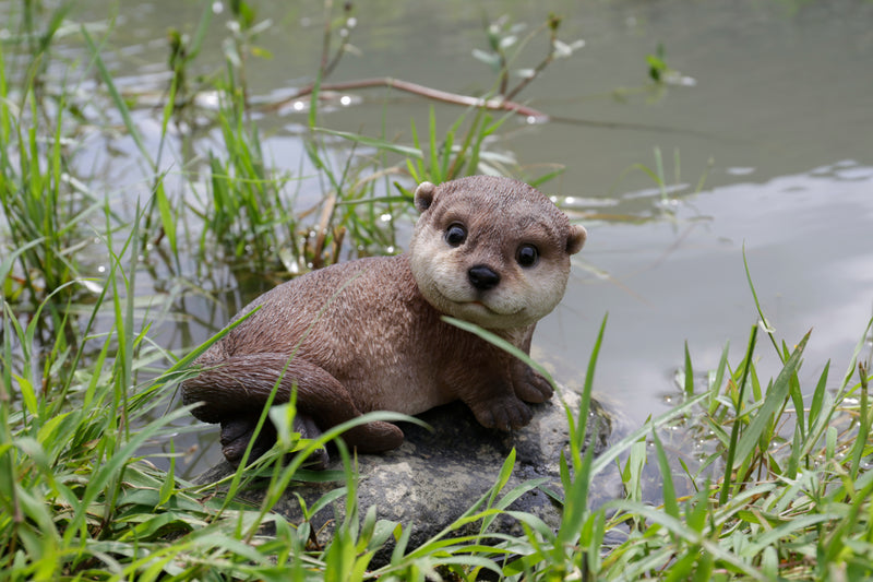 Otter Lying Statue HI-LINE GIFT LTD.