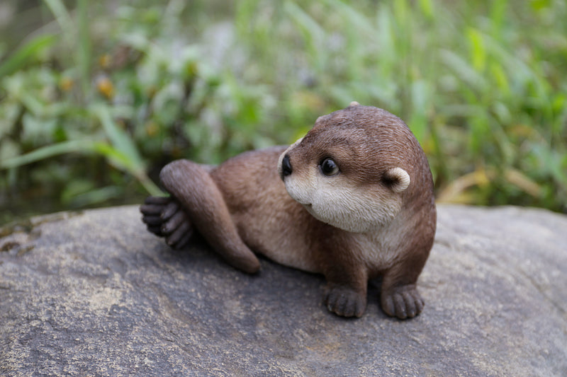 Otter Lying Statue HI-LINE GIFT LTD.