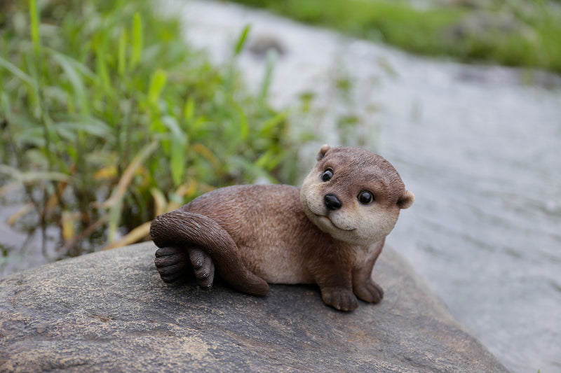 Otter Lying Statue HI-LINE GIFT LTD.